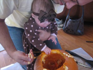 img_0281 The pumpkin felt really neat to Maggie!